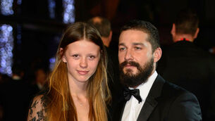 Mia Goth, left, and Shia LaBeouf appear at the premiere of the film Fury during the BFI London Film Festival in 2014 (Jonathan Short/Invision/AP)
