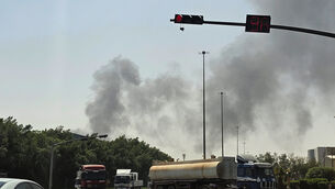<p>Vehicles travel along a road as black smoke billows from a fire at an oil facility in an industrial area in southern Riyadh (AP Photo)</p> <p>Vehicles travel along a road as black smoke billows from a fire at an oil facility in an industrial area in southern Riyadh (AP Photo)</p>