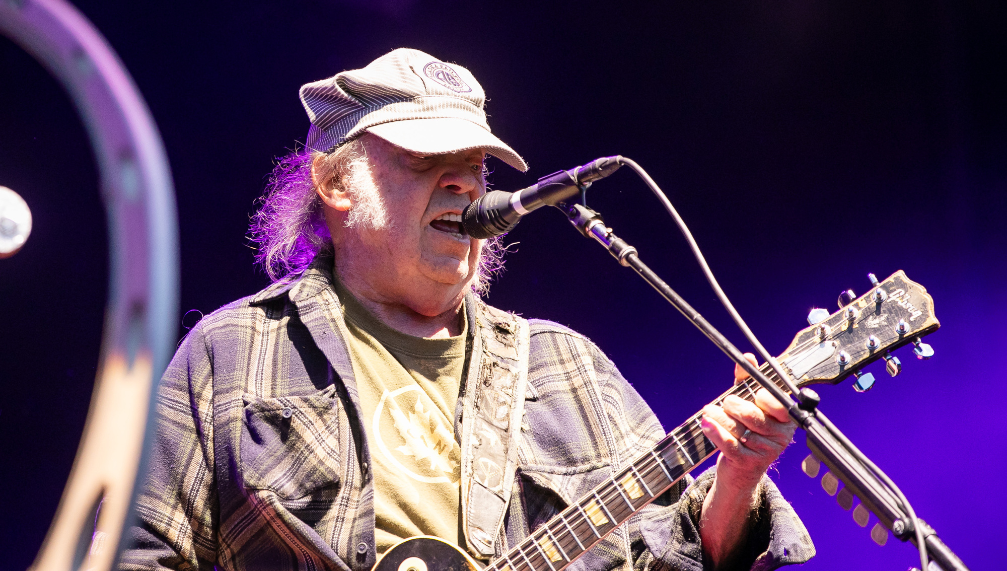 Neil Young in Performance at Malahide Castle, Co. Dublin. His lyrics to 'On The Beach' have a resonance with the way that AI is  in the process of disrupting the sleepy old pensions sector at every level on the cost and value chain. Photo: Gareth Chaney