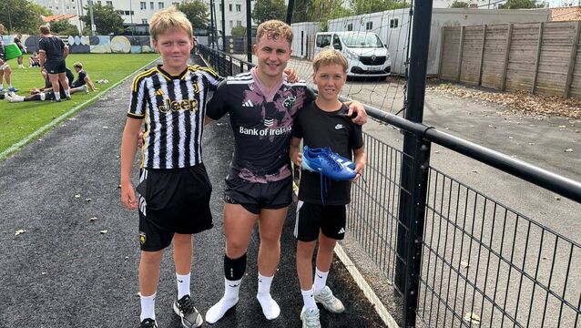 <p>NEW MUNSTER? Scrum half Craig Casey pictured with Ronan O'Gara's two sons, Zac (left) and Max during Munster's pre-season camp and friendly game in La Rochelle. O'Gara's older twins, Rua and Molly turn 18 this weekend.</p>