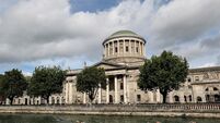A view of competitors in action outside the Four Courts 12/9/2026