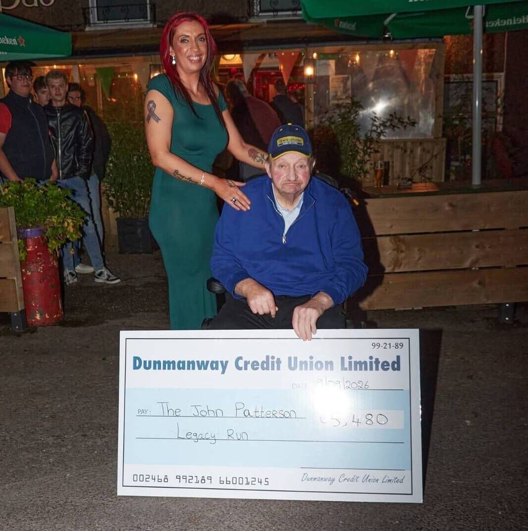 Sandra Patterson with her father John Patterson at the presentation night for the money raised as part of the 220km John Patterson Legacy tractor run.