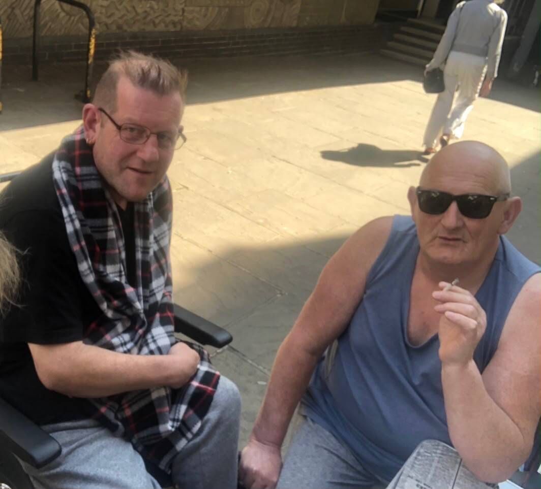 (Left to right) Stephen Aldridge and Patrick O'Sullivan at a cafe in Colchester, England in 2019. (Left to right) Stephen Aldridge and Patrick O'Sullivan at a cafe in Colchester, England in 2019.