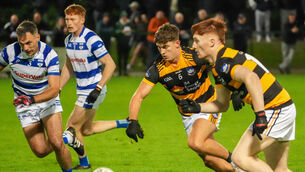 <p>Ryan Delaney of Canovee sails past the Inniscarra defence. Pic: Noel Sweeney</p>