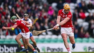 <p>Declan Dalton of Cork scores a penalty during the  Division 1A match between Cork and Waterford. Pic: Ben McShane/Sportsfile</p>