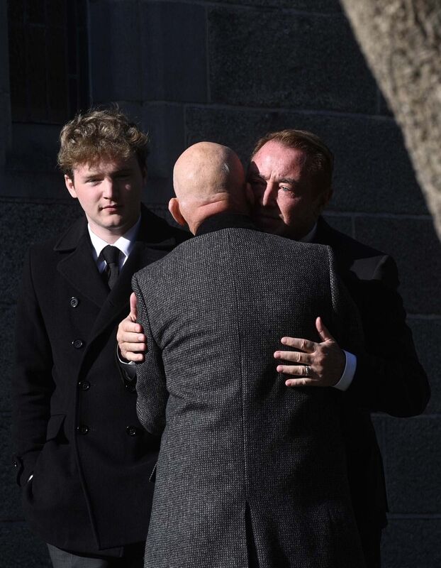 Michael Flatley greets a mourner before the funeral service of his wife Niamh O'Brien at the Church Of St. Therese, Mount Merrion, near Dublin. Picture: Mark Marlow/PA Wire