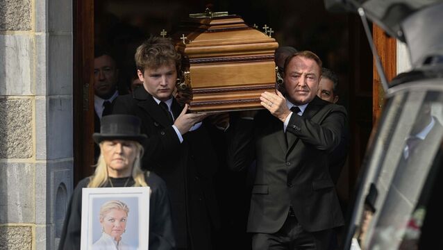 <p>Michael Flatley carries the coffin of his wife Niamh O'Brien, following her funeral service at the Church Of St. Therese, Mount Merrion, near Dublin. Picture: Mark Marlow/PA Wire</p>