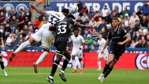 <p>FLYING HIGH: Swansea City's Adam Idah (left) scores his sides second goal during the Sky Bet Championship match at the Swansea.com Stadium, Swansea. Pic: Steven Paston/PA Wire</p>