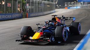 <p>CRUISING: Red Bull driver Max Verstappen during qualifying at Marina Bay Street Circuit, Singapore.</p>