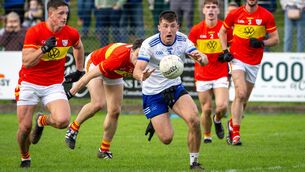 <p> OUTNUMBERED: Cill na Martra’s Tadhg Ó Corcora is chased down by the Éire Óg pack. Pic: Chani Anderson</p>