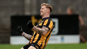 <p>The Downs’ Luke Loughlin celebrates at the final whistle. Pic: James Crombie/Inpho</p>