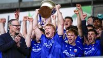 Cormac Egan lifts the trophy 11/10/2026