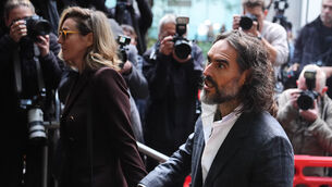 <p>Russell Brand arrives at Southwark Crown Court, London, where he faces three charges of rape, indecent assault, and three counts of sexual assault, relating to six women (James Manning/PA)</p>