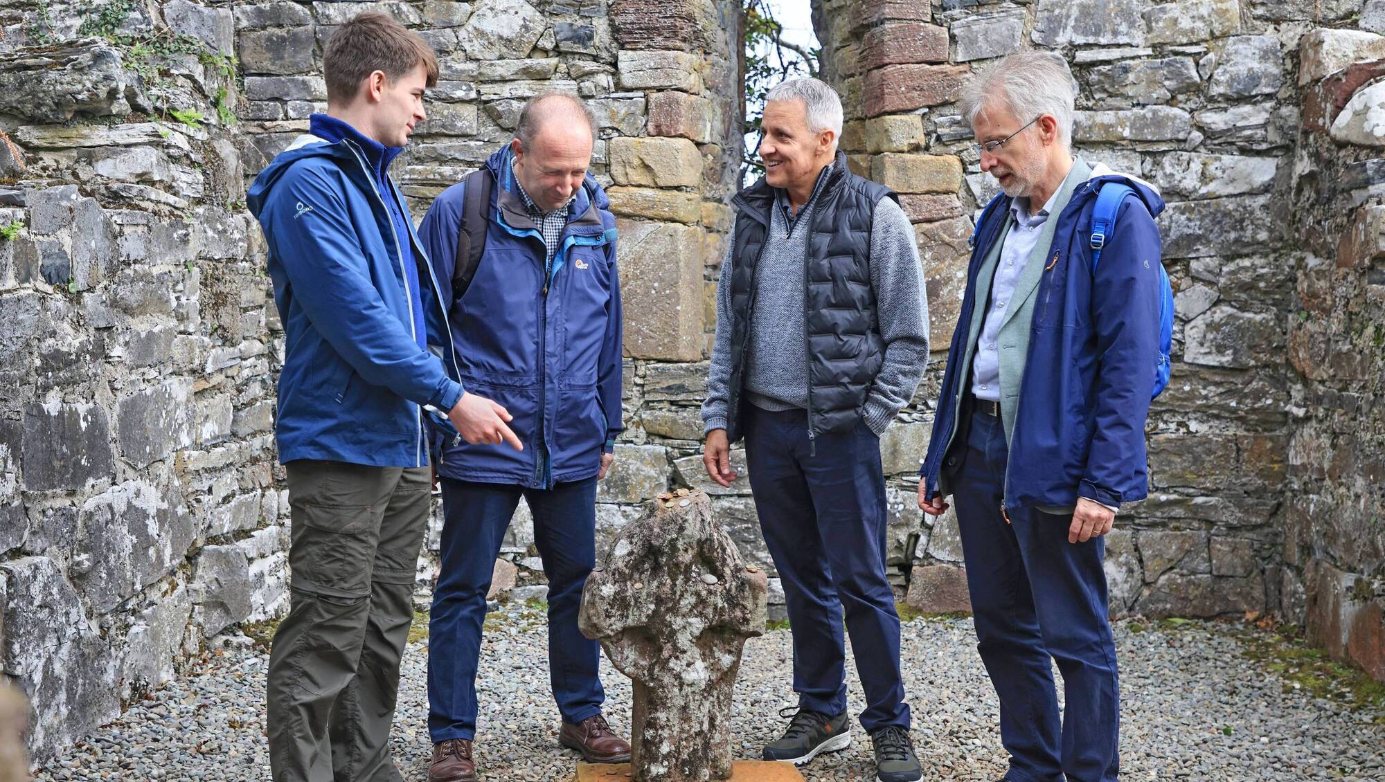 From left: James Knoblauch, organiser; Martin Kauffmann, Oxford medievalist and Bodleian Library head; Finbarr Kennelly, organiser, Killarney Chamber of Tourism and Commerce; and Mike Webb, curator of early modern archives and manuscripts at Bodleian Libraries, on Inisfallen Island. Picture: Valerie O'Sullivan