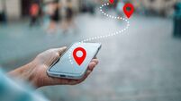 Woman tourist use maps app to navigate city, plan route from location to destination