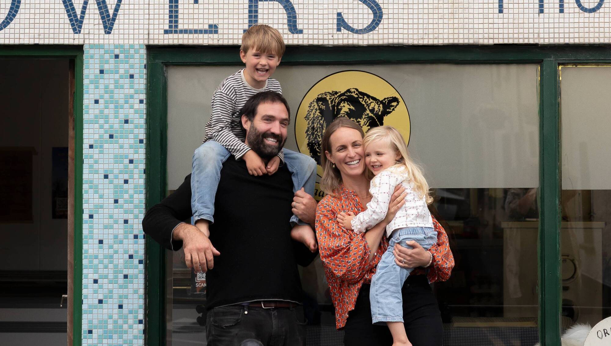 Nick and Cass McCarthy of Lúnasa Farm with their children outside their butcher shop in Clarecastle. 