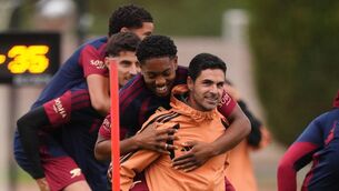 <p>Arsenal manager Mikel Arteta with Myles Lewis-Skelly during a training session at the Sobha Realty Training Centre. Pic: John Walton/PA Wire.</p>