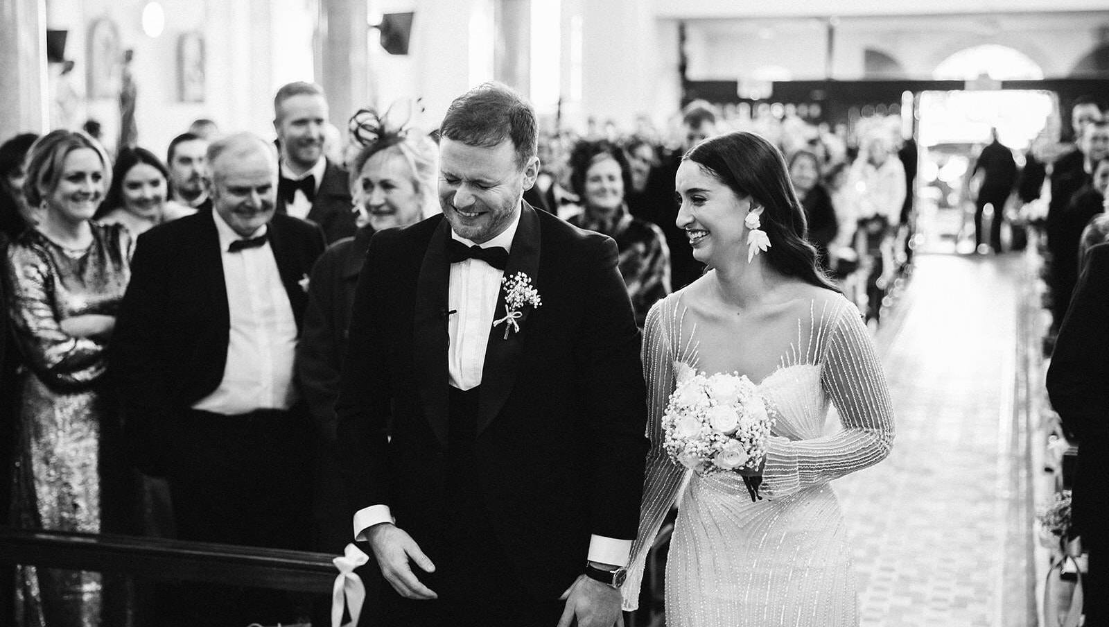 Rob and Orla Hennelly sharing a laugh during their wedding ceremony. Pictures: Gareth Lima Conlon