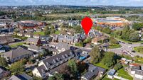 Upstairs living room and gated security at €575k Douglas home