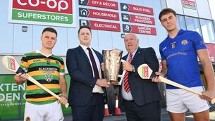 <p>Jerry Riordan, Operations Manager of Co Op Superstores and Noel O'Callaghan, vice chairman of the Cork county board with Adam Lynch of the Glen Rovers and Ben Cunningham who contest the Cork Premier SHC final at SuperValu Páirc Uí Chaoimh this Sunday. Pic: Eddie O'Hare</p>