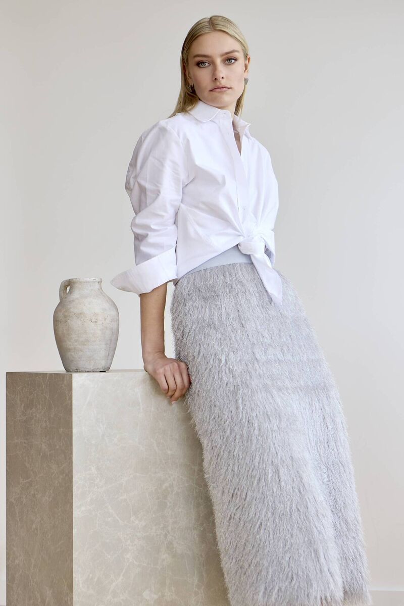 Helen McAlinden AW26, White shirt €85, Roz Silver tassel skirt €325 Helen McAlinden AW26, White shirt €85, Roz Silver tassel skirt €325