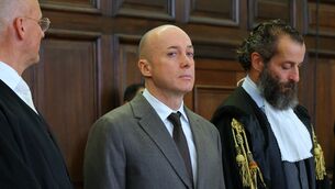 The defendant, Serhii Kuznietsov, stands between his lawyers during trial (Markus Scholz/dpa via AP) The defendant, Serhii Kuznietsov, stands between his lawyers during trial (Markus Scholz/dpa via AP)