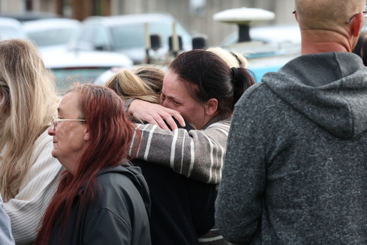  Family and friends offer each other condolences at Birchwood estate Co Waterford this afternoon as the community mourned  Kim and Philip English and their children Callum and Jayden. Picture: Stephen Collins/Collins  