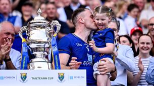 <p>Wicklow captain Dean Healy with his daughter Fia after the Tailteann Cup final. Pic: Ben McShane/Sportsfile</p>