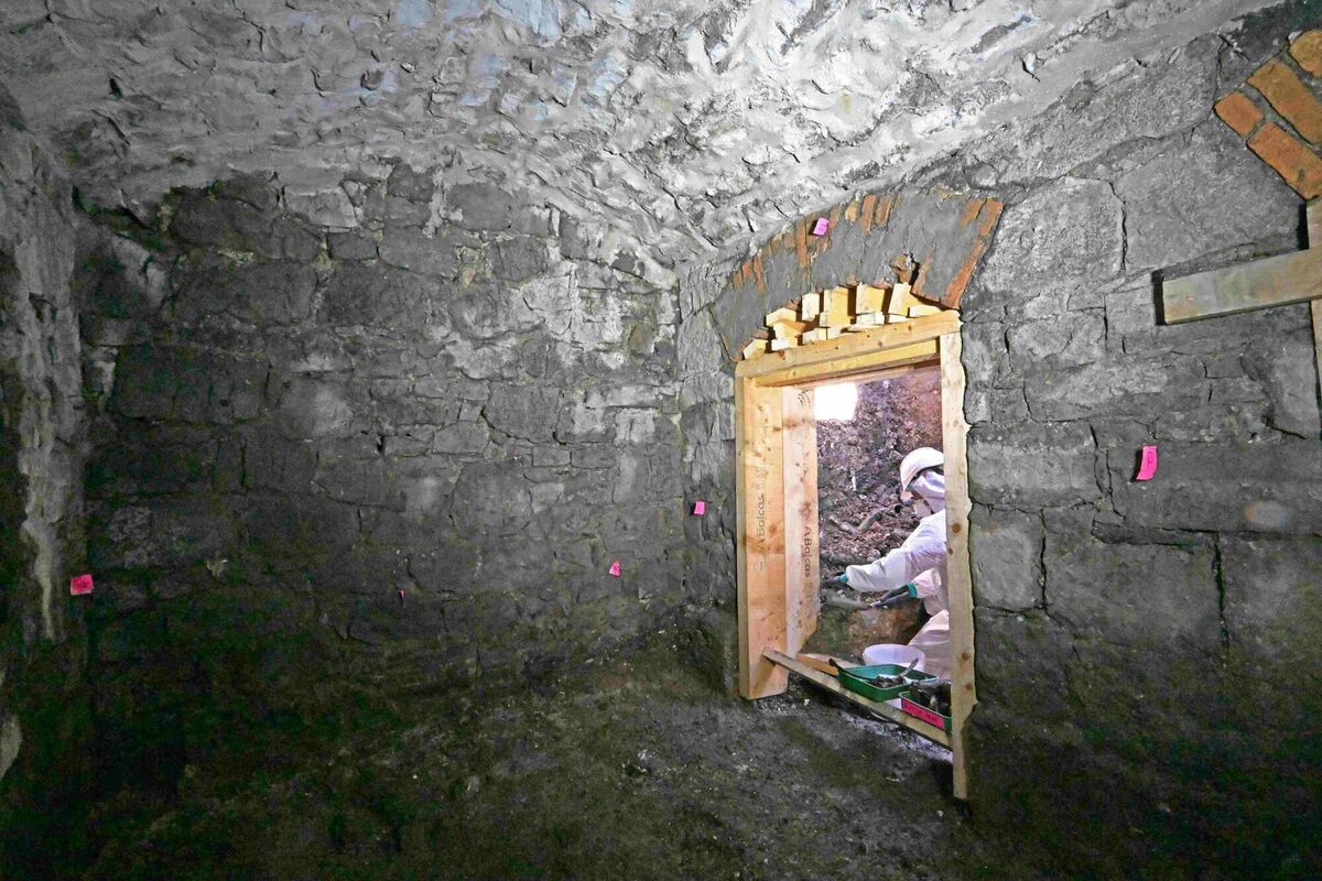 A forensic excavation team member working inside the subterranean vaulted structure at the site of the former mother and baby institution in Tuam, Co Galway. Picture: ODAIT A forensic excavation team member working inside the subterranean vaulted structure at the site of the former mother and baby institution in Tuam, Co Galway. Picture: ODAIT