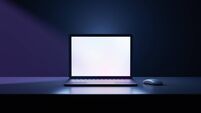 3D rendering illustration. Laptop computer with blank screen and color keyboard place table in the darkroom and blue lighting. I