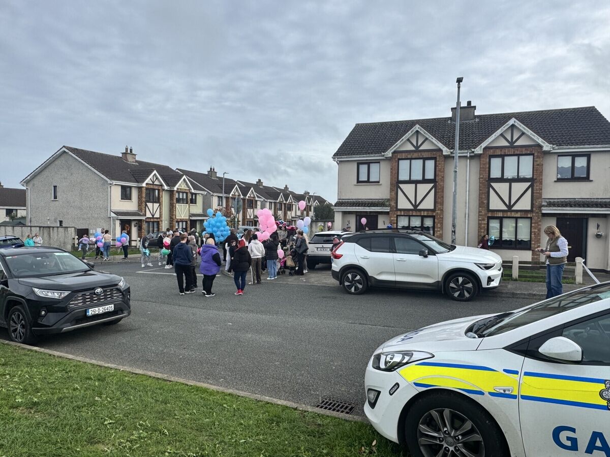 People gather ahead of a balloon release ceremony, to commemorate the lives lost in a house fire in Birchwood, Waterford. Picture: Micheal O Scannail/the Press Association People gather ahead of a balloon release ceremony, to commemorate the lives lost in a house fire in Birchwood, Waterford. Picture: Micheal O Scannail/the Press Association