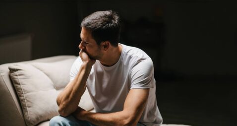 iStock-1484137360.jpg Depressed young man