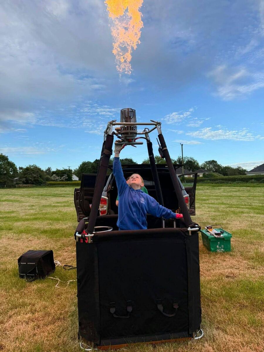 Evie Rose preparing her hot air balloon for a flight.