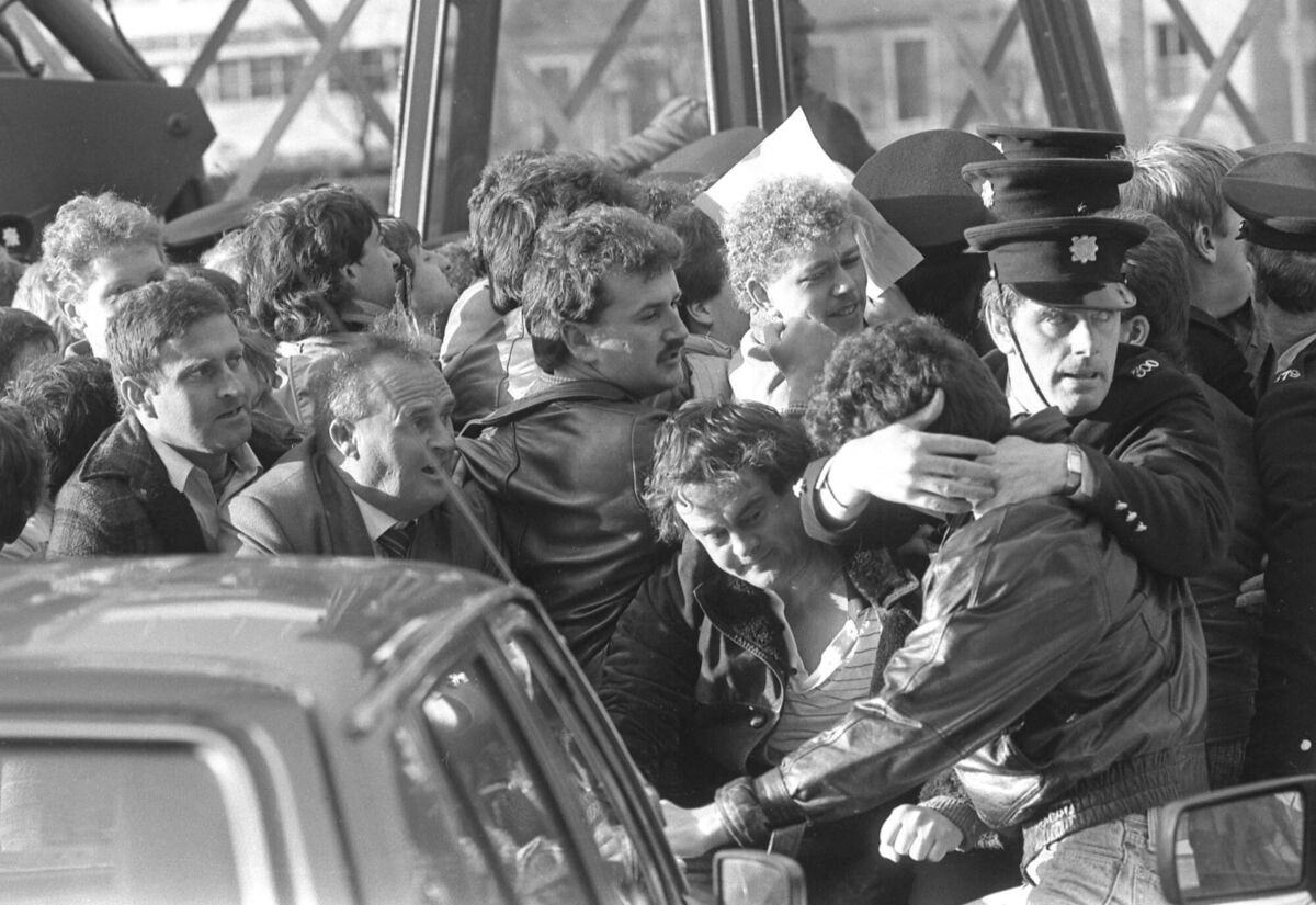  Gardaí struggle to contain workers during the Cork Corporation strike in October 1986.
