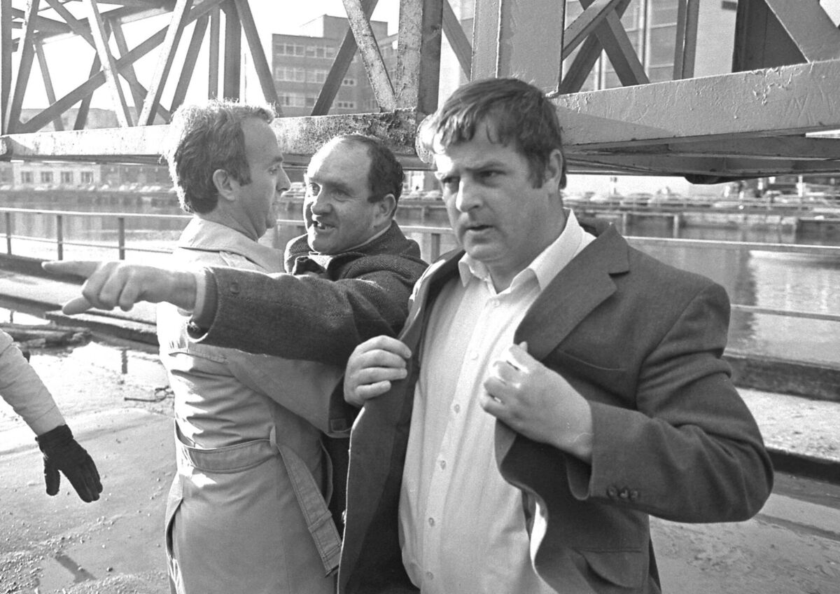 Councillor Joe O’Callaghan intervenes to hold back a defiant striker during the Cork Corporation strike.