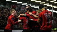 Ryan Burke celebrates scoring his side’s second goal with teammates 16/10/2026