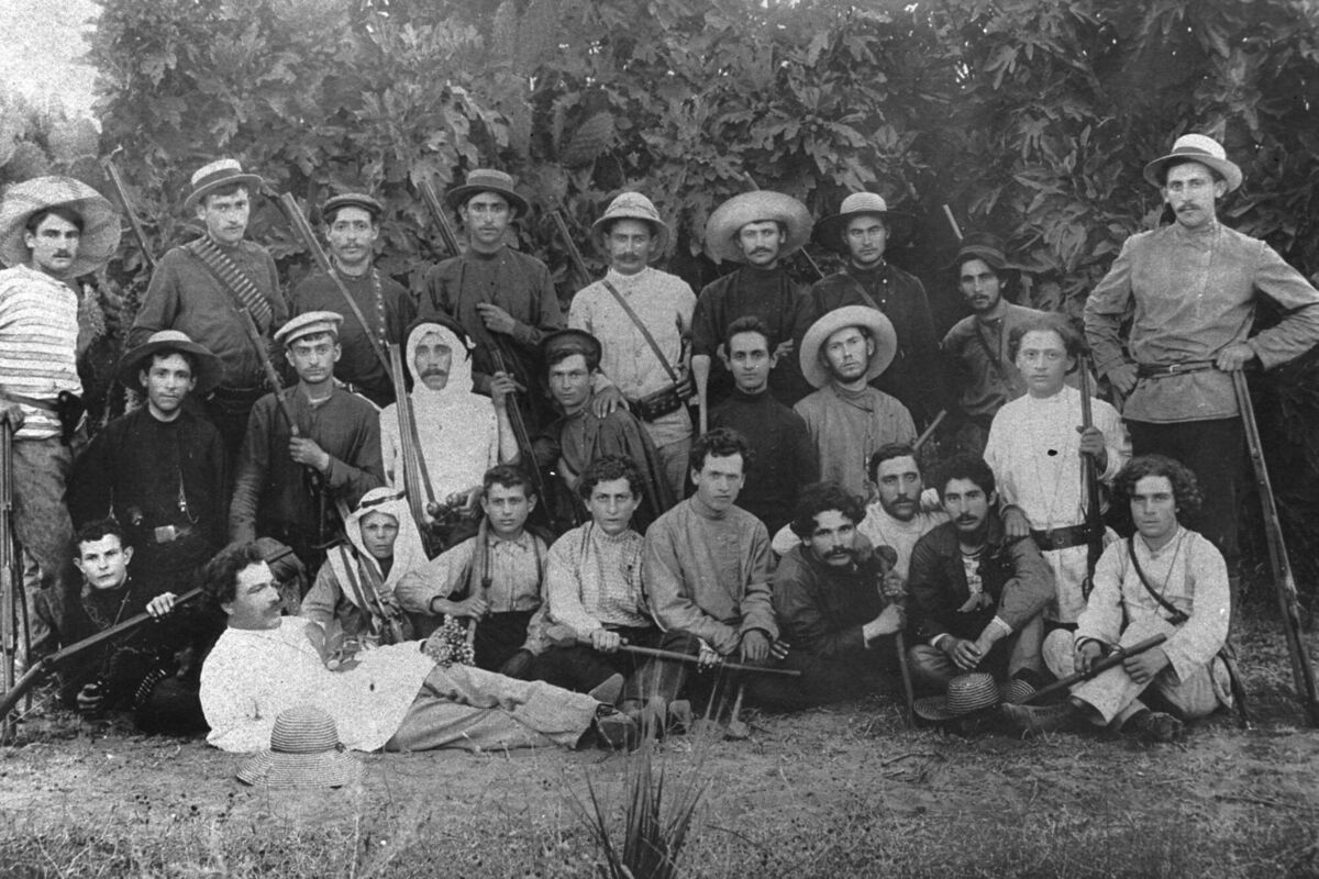 Members of Hashomer, a Jewish security organization dedicated to protecting Zionist settlements, pose with their rifles October 1, 1900 in the community of Rehovot during the Ottoman rule of Palestine in what would later become the State of Israel. (Photo by GPO via Getty Images)