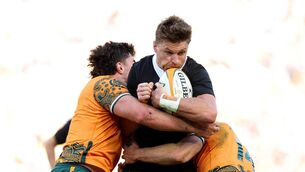 <p>BURSTING: New Zealand Beauden Barrett is halted by a Wallaby double act at Accor Stadium in Sydney. Pic: Cameron Spencer/Getty Images</p>