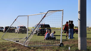 Police on the scene where a person drove a vehicle through a football field during a game in Wichita (Wyatt Glosson/KAKE via AP) Police on the scene where a person drove a vehicle through a football field during a game in Wichita (Wyatt Glosson/KAKE via AP)