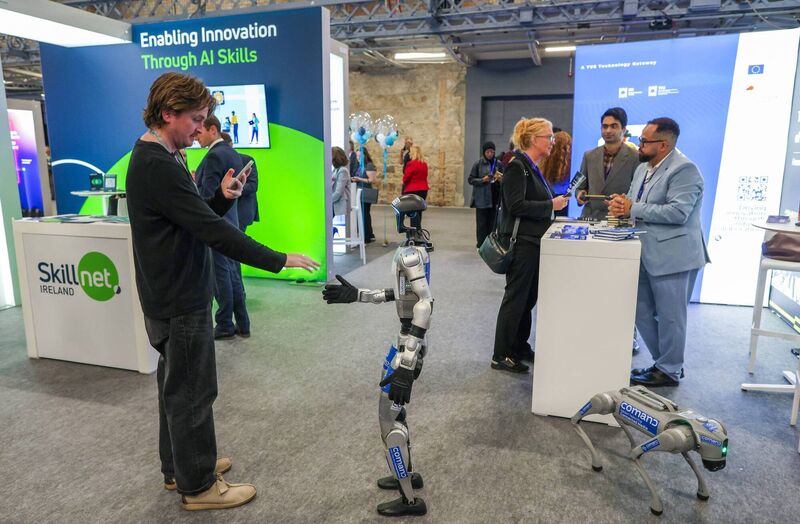 Comand AI logos are pictured on a Unitree G1 Humanoid agent AI avatar robot and a Go2 Quadruped Robot Dog during the International AI Summit in Dublin, File picture: Paul Faith/AFP/Getty Comand AI logos are pictured on a Unitree G1 Humanoid agent AI avatar robot and a Go2 Quadruped Robot Dog during the International AI Summit in Dublin, File picture: Paul Faith/AFP/Getty