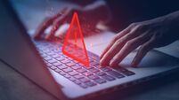 System hacked warning alert on notebook (Laptop). Cyber attack on computer network, Virus, Spyware, Malware or Malicious softwar