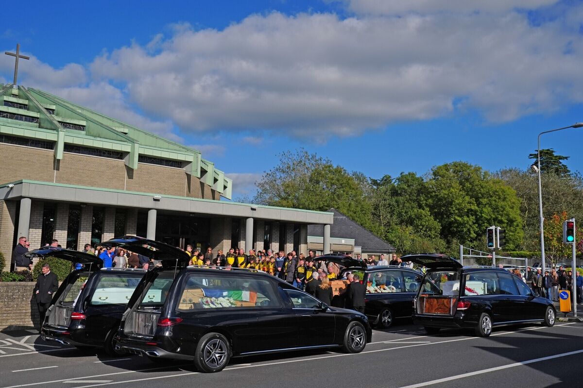 Four hearses carrying the coffins of Philip and Kim English and their sons, Jayden and Callum, arrive at the Sacred Heart Church Parish Centre, The Folly, Waterford, Picture: Brian Lawless/PA Four hearses carrying the coffins of Philip and Kim English and their sons, Jayden and Callum, arrive at the Sacred Heart Church Parish Centre, The Folly, Waterford, Picture: Brian Lawless/PA