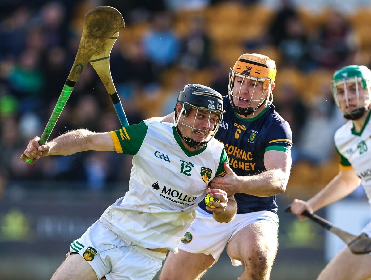 Mike O'Brien of Ballinamere in action against Cillian Kiely of Kilcormac-Killoughey. Pic: Michael P Ryan/Sportsfile
