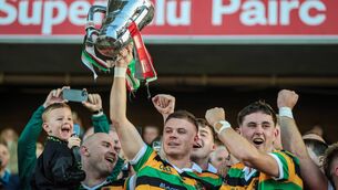 96051_3065166.jpg Adam Lynch lifts the Seán Óg Murphy Cup 18/10/2026