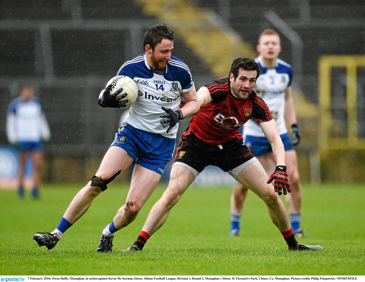 Monaghan’s Owen Duffy turns past Down’s Kevin Mc Kernan. Photo: Philip Fitzpatrick / SPORTSFILE Monaghan’s Owen Duffy turns past Down’s Kevin Mc Kernan. Photo: Philip Fitzpatrick / SPORTSFILE