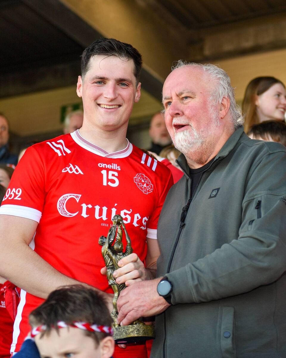 SHOOTING STAR: Éire Óg's Mark McInerney is presented with the trophy for top scoring in the Clare SFC from sponsor Martin Donnelly. Pic: Ger O'Neill SHOOTING STAR: Éire Óg's Mark McInerney is presented with the trophy for top scoring in the Clare SFC from sponsor Martin Donnelly. Pic: Ger O'Neill