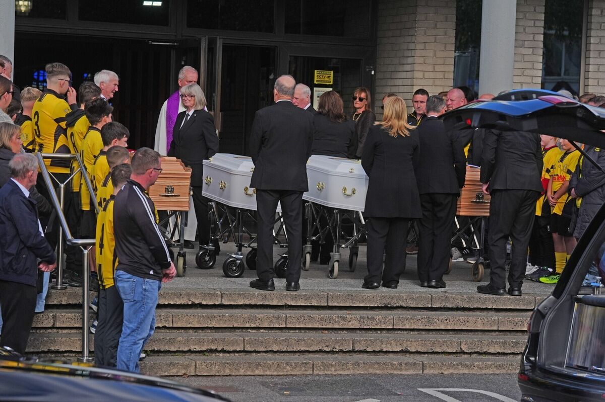 Four coffins of Philip and Kim English and their sons, Jayden and Callum, carried into Sacred Heart Church Parish Centre, The Folly, Waterford on Sunday, ahead of their funeral. Picture: Brian Lawless/PA Four coffins of Philip and Kim English and their sons, Jayden and Callum, carried into Sacred Heart Church Parish Centre, The Folly, Waterford on Sunday, ahead of their funeral. Picture: Brian Lawless/PA