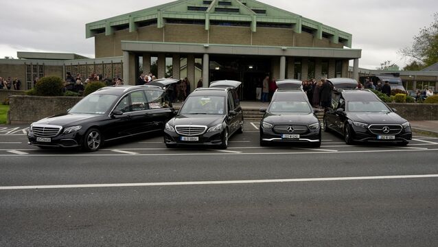 <p>Four hearses outside the Sacred Heart Church on The Folly, Waterford city, during the funeral service for the four members of the English family who died in an arson attack on their home. Picture: Noel Sweeney</p>