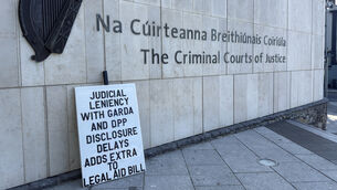 <p> A protest placard highlighting one of the issues in dispute between the minister and solicitors outside the Criminal Courts of Justice on Parkgate Street in Dublin in July. File picture: IrishPhotoDesk.ie</p> <p> A protest placard highlighting one of the issues in dispute between the minister and solicitors outside the Criminal Courts of Justice on Parkgate Street in Dublin in July. File picture: IrishPhotoDesk.ie</p>