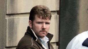 <p>Simon McGinley leaving court in June 2009  after he was jailed for the rape of a woman in her 80s.File picture: Paddy Cummins/PCPhoto.ie</p>